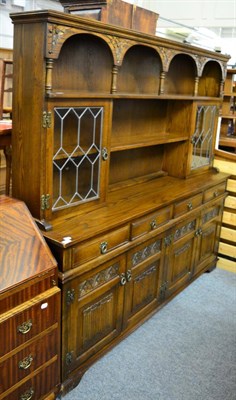 Lot 1143 - An old charm oak dresser and rack