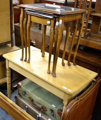 Lot 1145 - A pine side table, a nest of tables and two suitcases