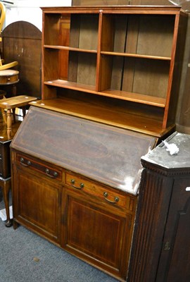 Lot 1150 - A mahogany bureau and a set open hanging shelves