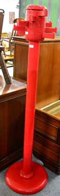 Lot 1160 - A 1950s red plastic coat stand