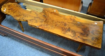 Lot 1161 - A modern naturalistic burr walnut bench