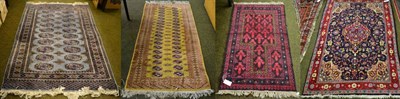 Lot 1233 - Pakistani Bukhara Lahore rug, the steel grey field with two columns of quartered guls, enclosed...