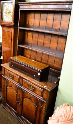 Lot 1246 - A reproduction oak dresser and rack, the rack with two fixed shelves, the base with two frieze...