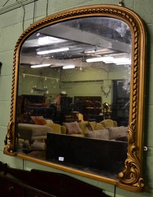 Lot 1249 - Arched gilt over mantel mirror