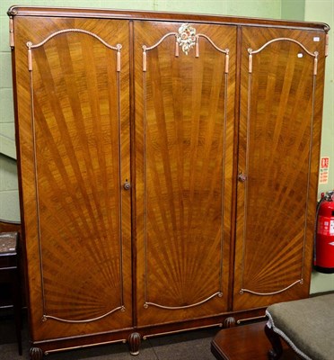 Lot 1260 - An Art Deco walnut triple wardrobe and matching headboard