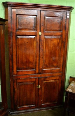 Lot 1264 - Pine corner cupboard with pair of panelled doors and shelved interior