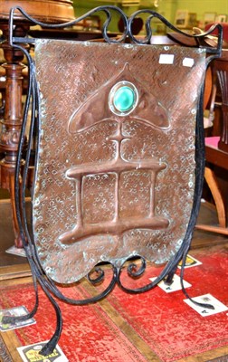 Lot 1279 - An Arts & Crafts copper and wrought iron fire screen with ruskin type cabochon