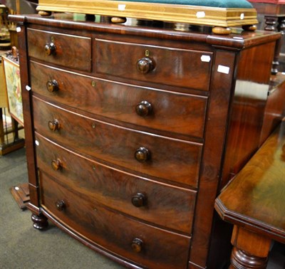 Lot 1292 - A 19th century mahogany five height bow fronted chest of drawers on bun feet