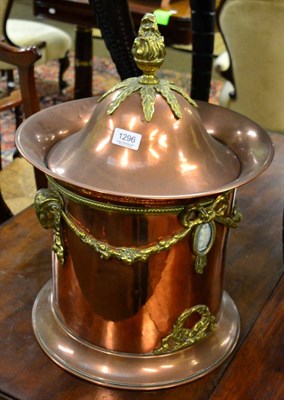 Lot 1296 - A copper and brass mounted decorative coal bucket, pull off cover with flame finial, the sides...