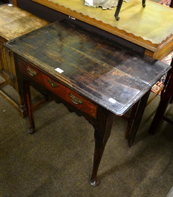 Lot 1299 - An 18th century oak lowboy