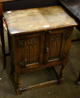 Lot 1300 - Reproduction oak bedside cupboard