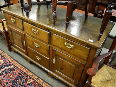 Lot 1303 - A George III oak dresser base