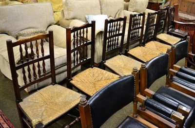 Lot 1317 - A set of six 19th century oak spindle back chairs with rush seats