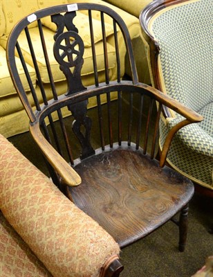 Lot 1336 - A 19th century elm seat Windsor armchair