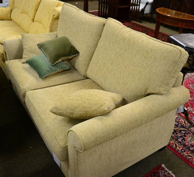 Lot 1338 - Modern two seated sofabed upholstered in oatmeal fabric