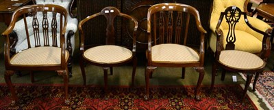 Lot 1344 - Two similar Edwardian occasional chairs; and a pair of armchairs with bell flower carved backs (4)