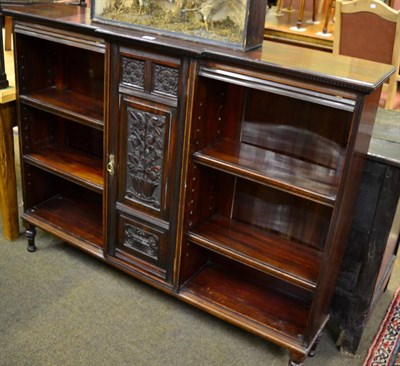 Lot 1355 - Mahogany open bookcase with central cupboard