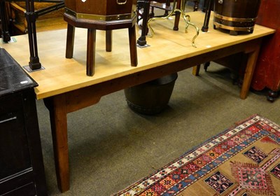 Lot 1362 - A large pine table with sycamore top