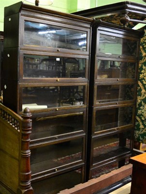 Lot 1368 - A near pair of Globe Wernicke style bookcases, each comprising six sections