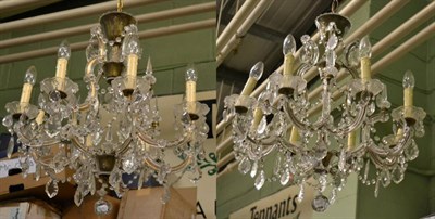 Lot 1397 - Pair of cut glass eight-light chandeliers (2)