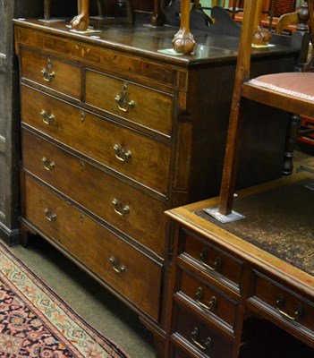 Lot 1405 - George III inlaid oak four height chest of drawers