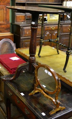 Lot 1406 - A 19th century mahogany occasional table; together with a painted toilet mirror (2)