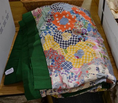 Lot 1443 - 20th century patchwork quilt, worked in hexagons of variously patterned and coloured fabrics,...