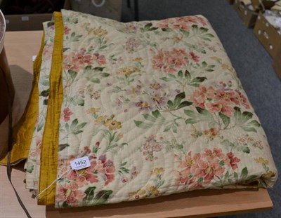 Lot 1452 - Floral printed cotton quilt, backed onto mustard coloured fabric worked with flowers and...