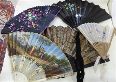 Lot 1453 - A 19th century painted fan with ivory sticks, together with four other later fans