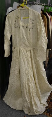 Lot 1489 - Circa 1940s wedding dress, labelled Jane Jones, Sunderland, with beaded decoration to the...