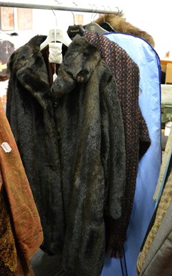 Lot 1505 - Faux fur coat, fox stole, two evening dresses, wedding dress with lace long sleeves and train, wool