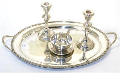 Lot 8 - A silver plated tray, a pair of dwarf candlesticks and a plated sugar and basin