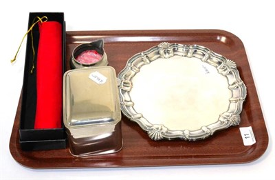 Lot 11 - A plated tray, hinged box, jug and a white metal scroll holder