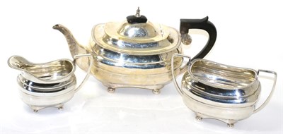 Lot 19 - A silver three piece tea service