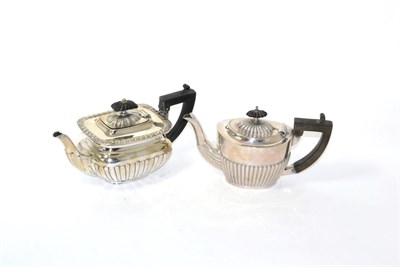 Lot 23 - A silver bachelors teapot and another