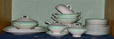 Lot 45 - A Gray's pottery green banded part dinner service, comprising three graduating meat plates,...