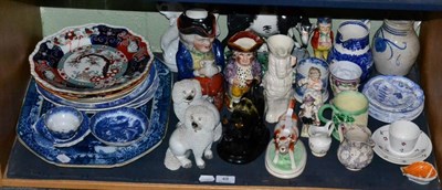 Lot 48 - A quantity of 19th century ceramics including Staffordshire flat back figurers, seater poodles,...