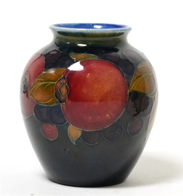 Lot 67 - A William Moorcroft small pomegranate pattern vase