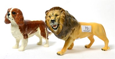 Lot 70 - A Beswick figure of a lion and a Beswick King Charles spaniel