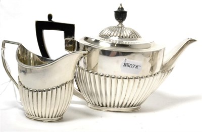 Lot 74 - Silver teapot and cream jug