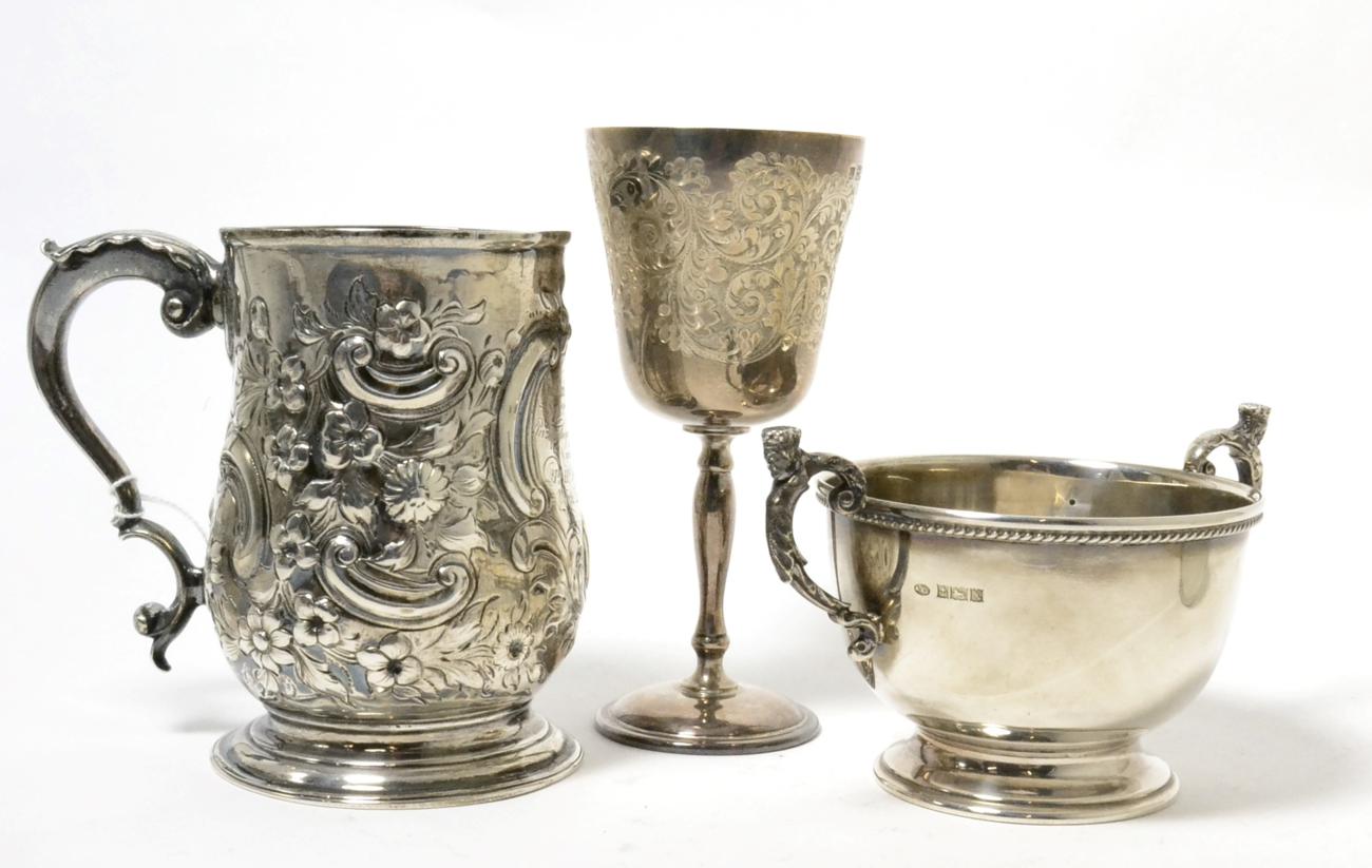 Lot 88 - A George III silver tankard, by Henry Chawner, London, 1796, later embossed and engraved;...