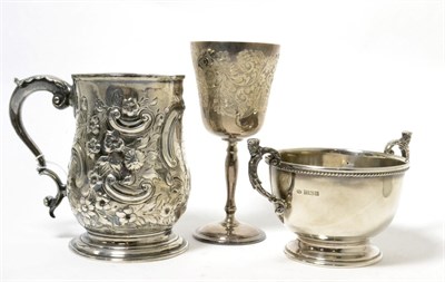 Lot 88 - A George III silver tankard, by Henry Chawner, London, 1796, later embossed and engraved;...