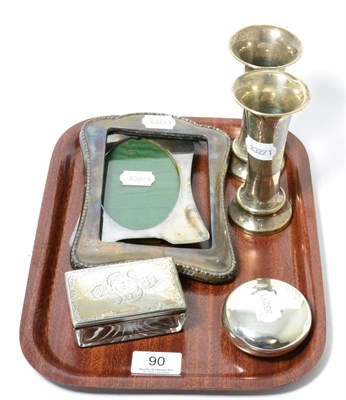 Lot 90 - Miscellaneous silver comprising two photo frames; a pair of waisted vases; a snuff box; a...