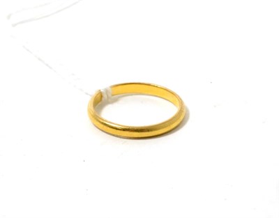 Lot 116 - A 22ct gold band ring, finger size M