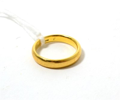 Lot 128 - A 22ct band ring, finger size K
