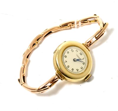Lot 137 - A lady's 9ct gold wristwatch signed J W Benson