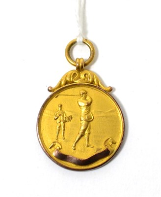 Lot 139 - A 9ct gold sport medallion, golf interest