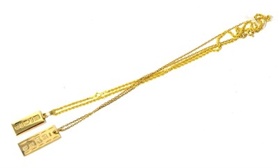Lot 147 - Two 9ct gold ingot pendants on chains