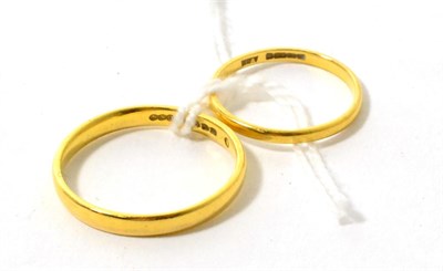 Lot 158 - Two 22ct gold band rings, finger size S and K1/2