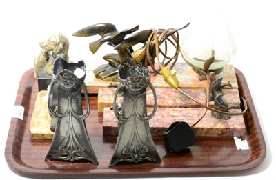Lot 179 - A group of Art Deco style patinated metal animals mounted on marble plinths together with a pair of